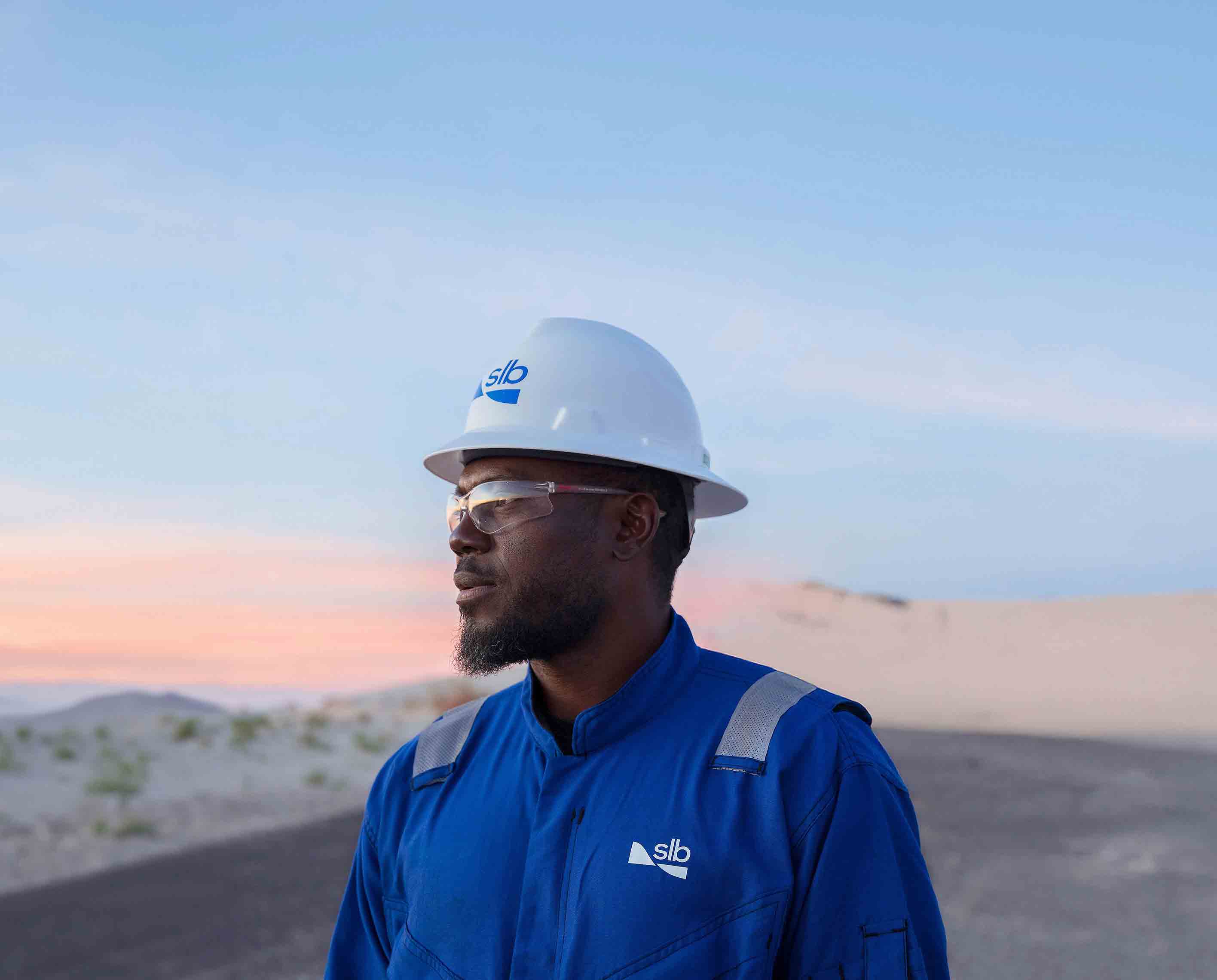 SLB employee looking at a landscape
